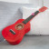 Guitare jouet rouge